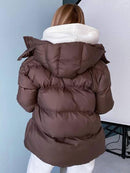 Jachetă elegantă pentru femei în jos - mai multe variante